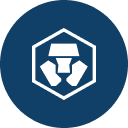 White geometric shield emblem with an abstract hard-hat-like symbol on a dark blue circular background.